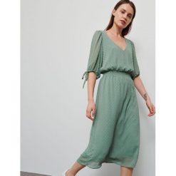Sukienka z tkaniny plumeti - Zielony. Zielone sukienki damskie Reserved, bez wzorów, z tkaniny, bez kołnierzyka, bez rękawów. Za 119,99 zł.