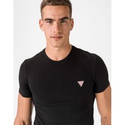 Guess Core Koszulka Czarny. Czarne podkoszulki męskie Guess, l, z haftami, z elastanu, bez kołnierzyka, krótkie. Za 133,95 zł.