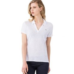 Koszulka polo w kolorze białym. Białe koszulki damskie Lacoste, l, z haftami, polo. W wyprzedaży za 199,95 zł.