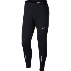 Spodnie do biegania męskie NIKE DRY PHENOM RUNNING PANT / 857838-010. Spodnie męskie Nike, m, bez wzorów. Za 259,99 zł.
