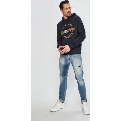 Tommy Hilfiger - Bluza. Niebieskie bluzy męskie TOMMY HILFIGER, s, z nadrukiem, z bawełny, z kapturem, bez rękawów, z kapturem. W wyprzedaży za 459,90 zł.