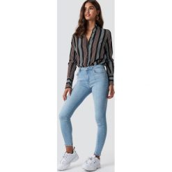 NA-KD Jeansy Skinny Mid Waist Front Panel - Blue. Niebieskie spodnie z wysokim stanem NA-KD, z jeansu. Za 141,95 zł.