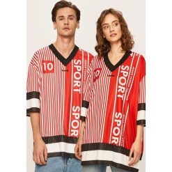 Hummel - T-shirt. Czerwone topy damskie Hummel, s, bez wzorów, z poliesteru, z krótkim rękawem. Za 259,90 zł.