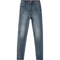 Desigual jeansy damskie Denim Fraternité 25 niebieskie. Niebieskie jeansy damskie Desigual, z jeansu. Za 399,00 zł.