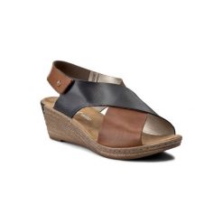 RIEKER 62486-24 Brązowy. Pomarańczowe sandały damskie Rieker, bez wzorów, ze skóry, bez obcasa, bez zapięcia. Za 239,99 zł.