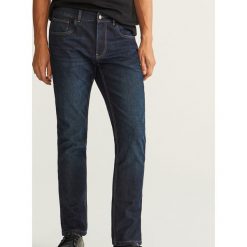 Jeansy slim fit z ociepleniem - Granatowy. Niebieskie jeansy męskie relaxed fit marki Reserved. Za 149,99 zł.