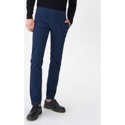 Spodnie chino - Granatowy. Niebieskie spodnie męskie House, s, bez wzorów. W wyprzedaży za 69,99 zł.