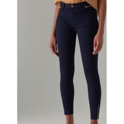 Spodnie skinny z zamkami - Niebieski. Niebieskie spodnie damskie Mohito. Za 119,99 zł.