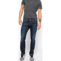 Pepe Jeans - Jeansy Cane. Niebieskie jeansy męskie Pepe Jeans, z aplikacjami, z obniżonym stanem. W wyprzedaży za 199,90 zł.