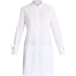 InWear SAIA LONG SHIRT Tunika pure white. Białe bluzki damskie InWear, s, bez wzorów, z bawełny, bez kołnierzyka, bez rękawów. Za 419,00 zł.