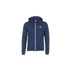 Bluzy Le Coq Sportif FOUKO. Niebieskie bluzy męskie le coq sportif, s, bez wzorów, bez kołnierzyka, bez rękawów, bez kaptura. Za 279,20 zł.