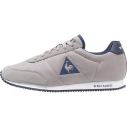 Le coq sportif RACERONE NYLON Tenisówki i Trampki titanium/dress blue. Szare tenisówki męskie le coq sportif, z materiału. W wyprzedaży za 215,20 zł.