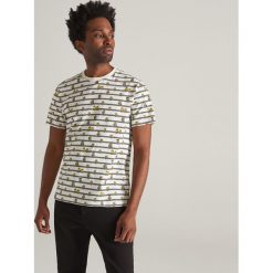 T-shirt z nadrukiem Minionki - Kremowy. Białe t-shirty męskie Reserved, s, z nadrukiem, bez kołnierzyka. Za 59,99 zł.