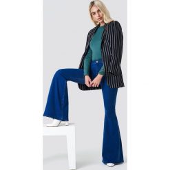 Spodnie damskie: Trendyol Jeansy dzwony - Blue