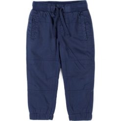 Coccodrillo - Spodnie dziecięce 92-116 cm. Niebieskie kalesony męskie marki COCCODRILLO, z bawełny. W wyprzedaży za 59,90 zł.