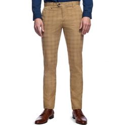 Spodnie STEFANO SMES030072. Brązowe spodnie męskie Giacomo Conti, na co dzień, m, bez wzorów, z elastanu, eleganckie. Za 259,00 zł.