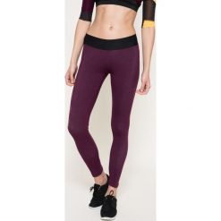 Reebok - Legginsy. Fioletowe legginsy marki Reebok, s, z nadrukiem, z elastanu. W wyprzedaży za 129,90 zł.