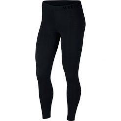 Legginsy Nike Pro Warm Tight W Czarne. Czarne spodnie damskie marki Nike, bez wzorów, ze skóry, do biegania. Za 149,99 zł.