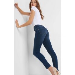 Jegginsy push-up. Niebieskie legginsy we wzory Orsay, s, z bawełny. Za 79,99 zł.