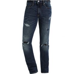 GAP Jeans Skinny Fit indigo destroy. Niebieskie jeansy męskie relaxed fit marki GAP. Za 299,00 zł.