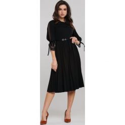 Czarna Sukienka Rayner. Czarne sukienki damskie Renee, s, w paski, z dzianiny, eleganckie, rozkloszowane. Za 109,99 zł.