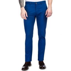 Spodnie BIAGIO SMNS030011. Niebieskie spodnie męskie Giacomo Conti, s, bez wzorów, z elastanu, eleganckie. Za 199,00 zł.