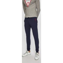 Guess Jeans - Spodnie. Czarne spodnie męskie Guess Jeans, na co dzień, s, z aplikacjami, z elastanu, casualowe. Za 369,90 zł.