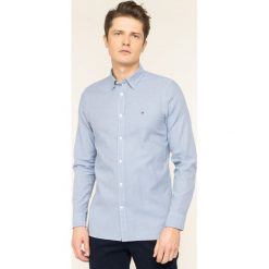 Koszula TOMMY HILFIGER MW0MW10698. Niebieskie koszule męskie TOMMY HILFIGER, xl, bez wzorów, z bawełny, casualowe, bez kołnierzyka, bez rękawów. W wyprzedaży za 209,00 zł.