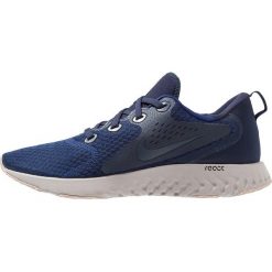 Nike Performance LEGEND REACT Obuwie do biegania treningowe blue void/thunder blue/obsidian/diffused taupe/moon particle. Niebieskie buty do biegania męskie Nike Performance, z materiału. Za 419,00 zł.