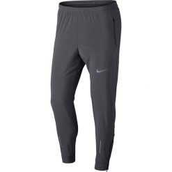 Spodnie do biegania męskie NIKE FLEX ESSENTIAL PANT / 885280-036. Spodnie męskie Nike, m, bez wzorów. Za 159,99 zł.