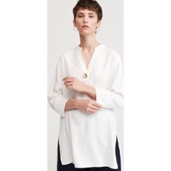 Długa bluzka oversize - Kremowy. Białe bluzki damskie Reserved. Za 119,99 zł.