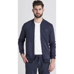 BLUZA. Niebieskie bluzy męskie Armani Exchange, s, z aplikacjami, z materiału, z okrągłym kołnierzem, bez rękawów, bez kaptura. Za 389,40 zł.
