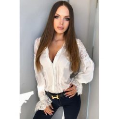 Damska bluzka DIVA. Bluzki damskie Damska bluzka DIVA, s, bez wzorów, bez kołnierzyka, bez rękawów. W wyprzedaży za 89,00 zł.