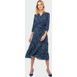 Sukienka midi z falbanami - 38. Sukienki damskie e-margeritka.pl, bez wzorów, z tkaniny, eleganckie, z długim rękawem, długie, bez kaptura. Za 149,99 zł.