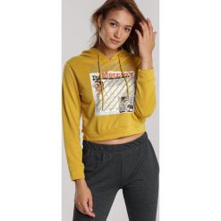 Żółta Bluza Kelasis. Żółte bluzy damskie Renee, s, bez wzorów, bez rękawów, z kapturem. Za 69,99 zł.
