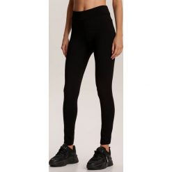 Czarne Legginsy Fyrelvia. Czarne legginsy damskie Renee, s, bez wzorów. Za 69,99 zł.
