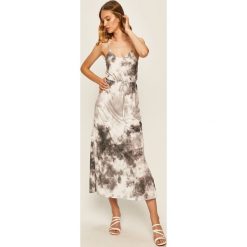 Answear - Sukienka. Czarne sukienki damskie ANSWEAR, na co dzień, s, bez wzorów, z bawełny, casualowe, bez kołnierzyka, bez rękawów, midi, rozkloszowane. Za 119,90 zł.