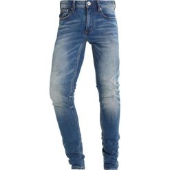 Superdry Jeansy Slim Fit cali vintage blue. Niebieskie jeansy męskie relaxed fit marki Superdry, z bawełny. W wyprzedaży za 335,20 zł.