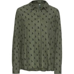 Bluzka "boxy" bonprix oliwkowo-czarny z nadrukiem. Zielone bluzki asymetryczne bonprix, z nadrukiem. Za 49,99 zł.