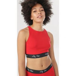 Czerwony Top Daemnara. Czerwone topy damskie Born2be, s, bez wzorów, bez kołnierzyka. Za 29,99 zł.