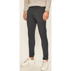 Tailored & Originals - Spodnie. Niebieskie spodnie męskie Tailored & Originals, bez wzorów, z elastanu. Za 299,90 zł.