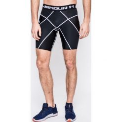 Under Armour - Szorty Armour Core. Szare spodenki sportowe męskie marki Under Armour, z elastanu, sportowe. W wyprzedaży za 119,90 zł.