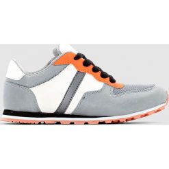 Niskie, dziecięce trampki z płótna. Niebieskie buty chłopięce sportowe marki La Redoute Collections, z materiału. Za 80,81 zł.