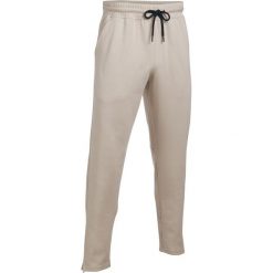 Spodnie dresowe damskie: Under Armour Spodnie sportowe Ali Knit Pant-OAH//BLK beżowe r. S (1290302-250)