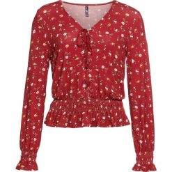 Bluzka shirtowa bonprix czerwony w kwiaty. Czerwone koszulki damskie bonprix, w kwiaty, bez kołnierzyka, bez rękawów. Za 89,99 zł.
