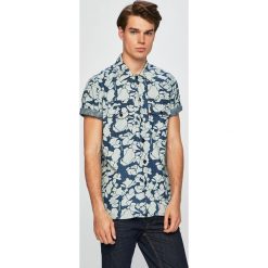 Levi's - Koszula Justin Timberlake. Niebieskie koszule męskie Levi's®, s, bez wzorów, z bawełny, casualowe, z włoskim kołnierzykiem, z krótkim rękawem. W wyprzedaży za 179,90 zł.