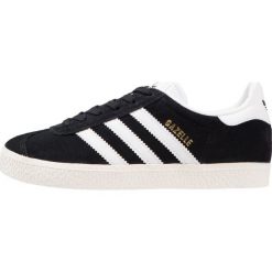 Adidas Originals GAZELLE Tenisówki i Trampki core black/white/gold metallic. Czarne tenisówki damskie adidas Originals, ze skóry ekologicznej. W wyprzedaży za 359,10 zł.