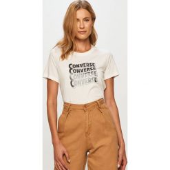 Converse - T-shirt. Białe bluzki damskie Converse, s, z nadrukiem, z bawełny, casualowe, z okrągłym kołnierzem, z krótkim rękawem. W wyprzedaży za 99,90 zł.