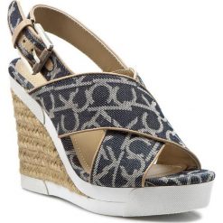 Espadryle CALVIN KLEIN JEANS - Elaine RE9609 Midnight/N. Niebieskie espadryle damskie Calvin Klein Jeans, bez wzorów, z jeansu, bez obcasa, na obcasie. W wyprzedaży za 289,00 zł.