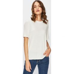 Jacqueline de Yong - Top. Niebieskie bluzki damskie marki Jacqueline de Yong, s, bez wzorów, z poliesteru, casualowe, bez kołnierzyka, z krótkim rękawem. Za 69,90 zł.